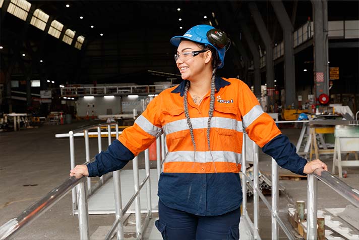 Female working in shipbuilding yard