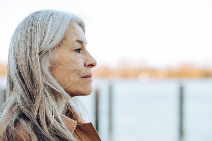 What is depression - mature woman looking out on the ocean